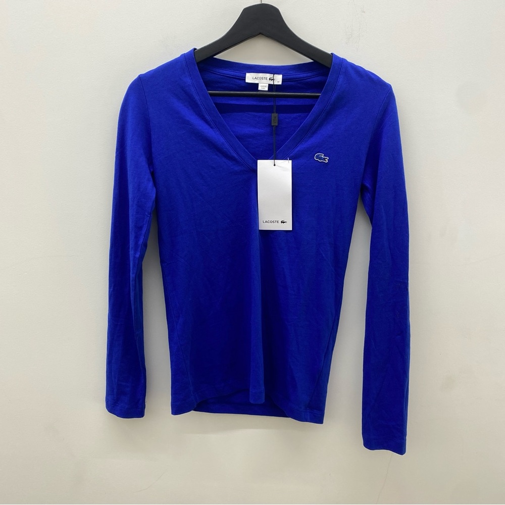 Lacoste women LS. Brand new with tag.Size 32.